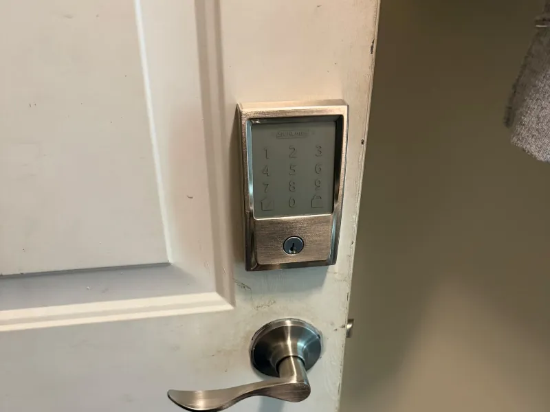 Keypad deadbolt and lever handle on a residential door